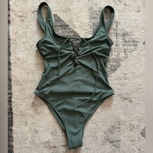 Sexy high cut soft ribbed plunging one piece